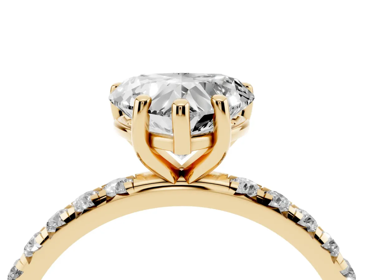 Heart Cut Cut Diamond Solitaire Ring with Micro Pave Band and Four Prong Setting Yellow gold