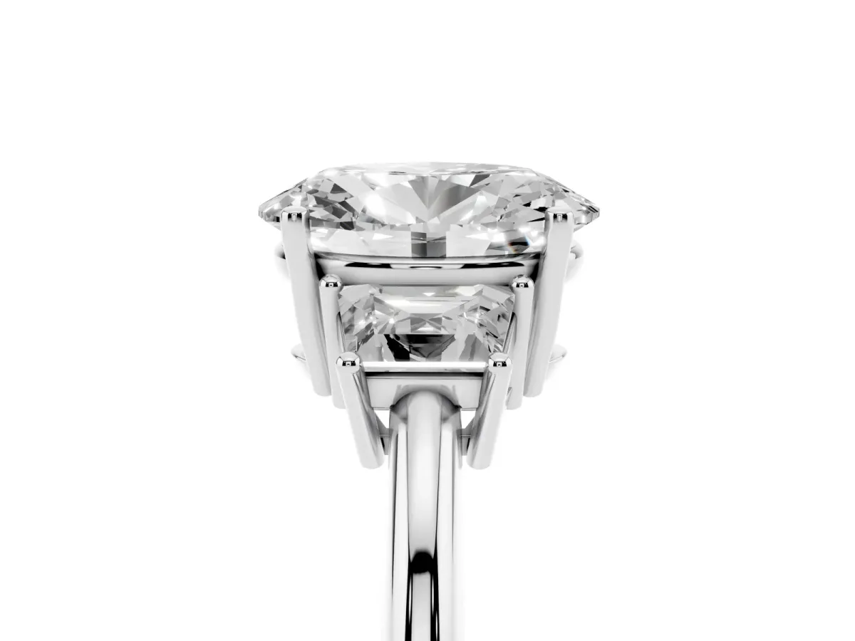 Oval Cut Diamond Three-Stone Ring with Trapezoid Side Stones and Prong Setting Platinum