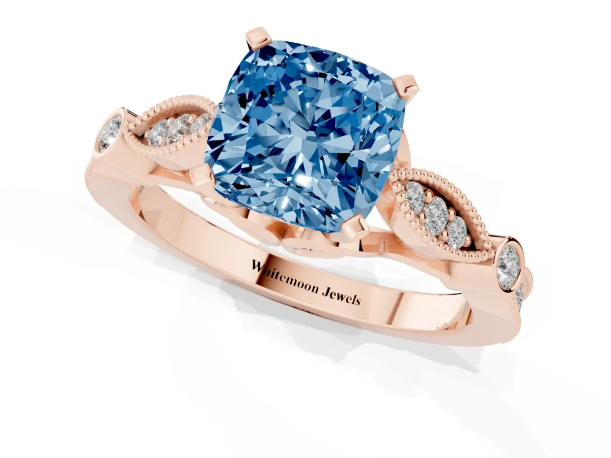 Fancy Blue Cushion Cut Cut Diamond with Milgrain Marquise and Bezel Accents on a Solitaire Band with Prong Setting Rose gold