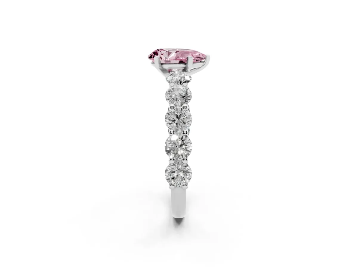 Fancy Pink Pear Cut Diamond Prong Setting with Side Stones on a Pave Band Silver