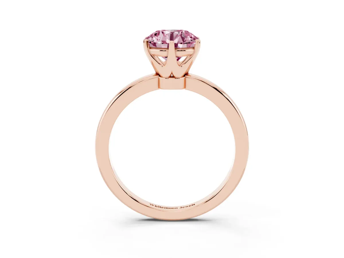 Fancy Pink Round Cut Solitaire Diamond Ring with Six-Prong Setting on a Classic Band Rose gold