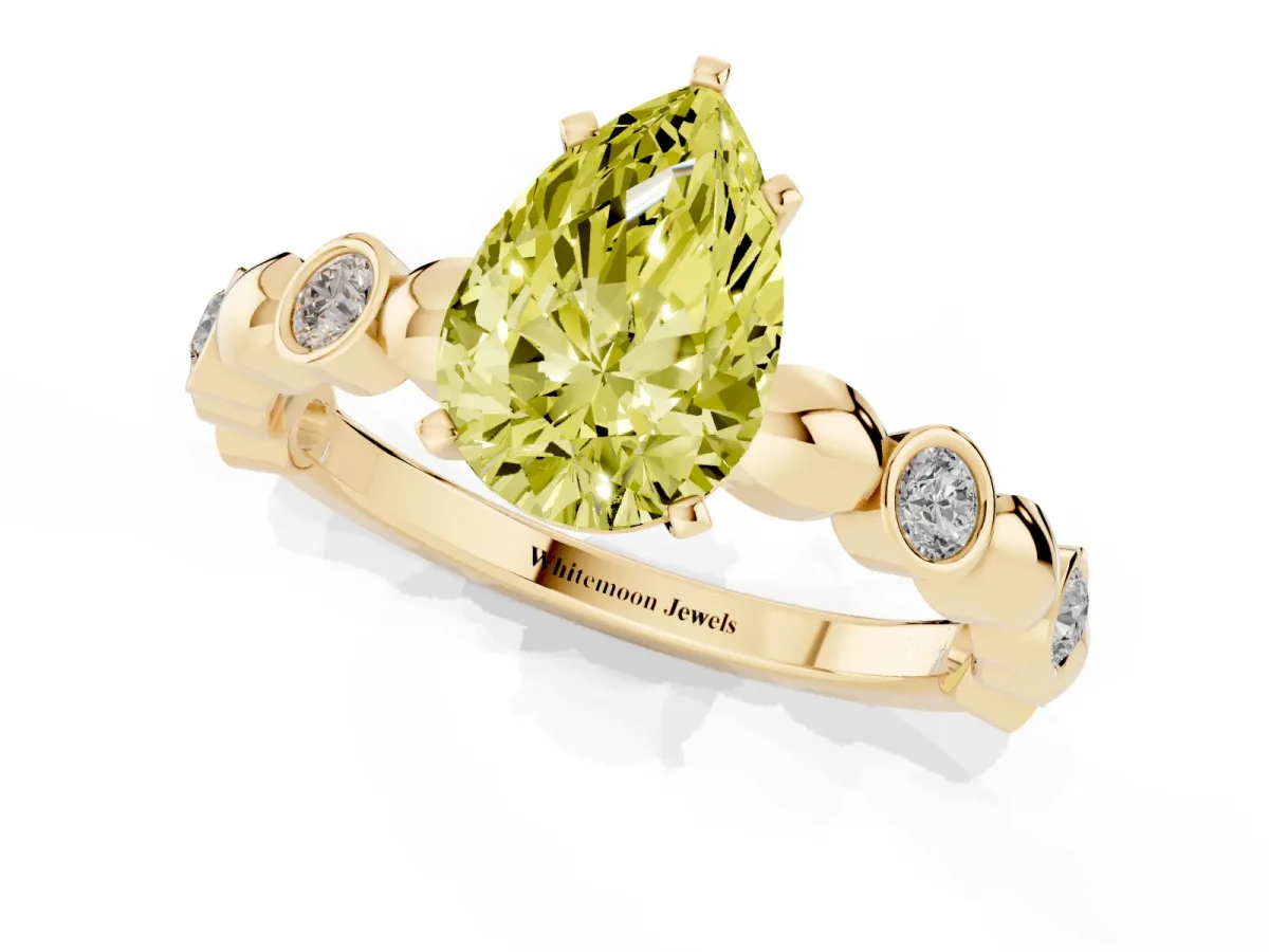 Fancy Yellow Pear Cut Solitaire Bezel-Set Diamond Ring with Beaded Band and Four-Prong Setting Yellow gold