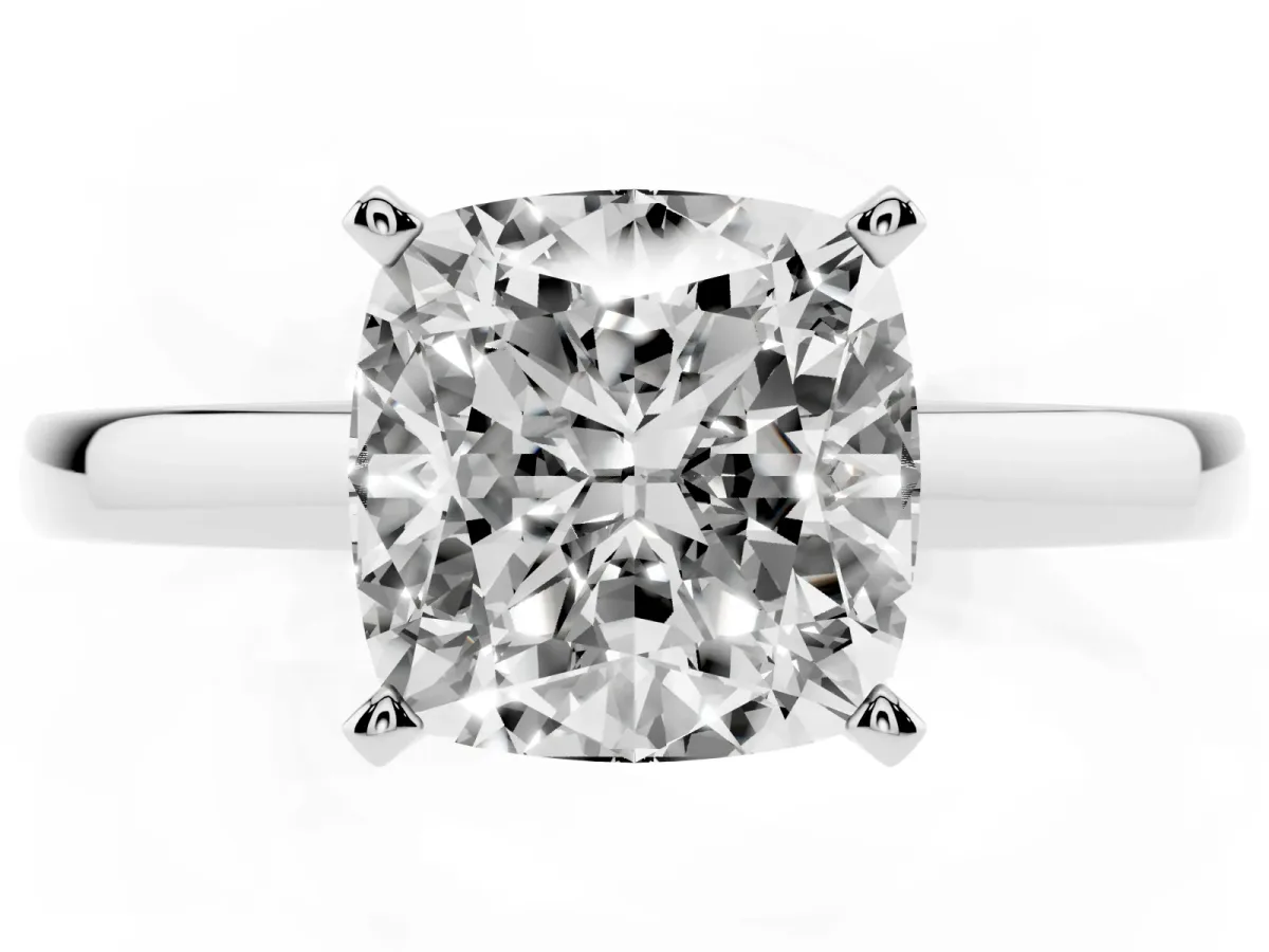 Cushion Cut Solitaire Diamond Engagement Ring with Four-Prong Setting on a Classic Band Silver