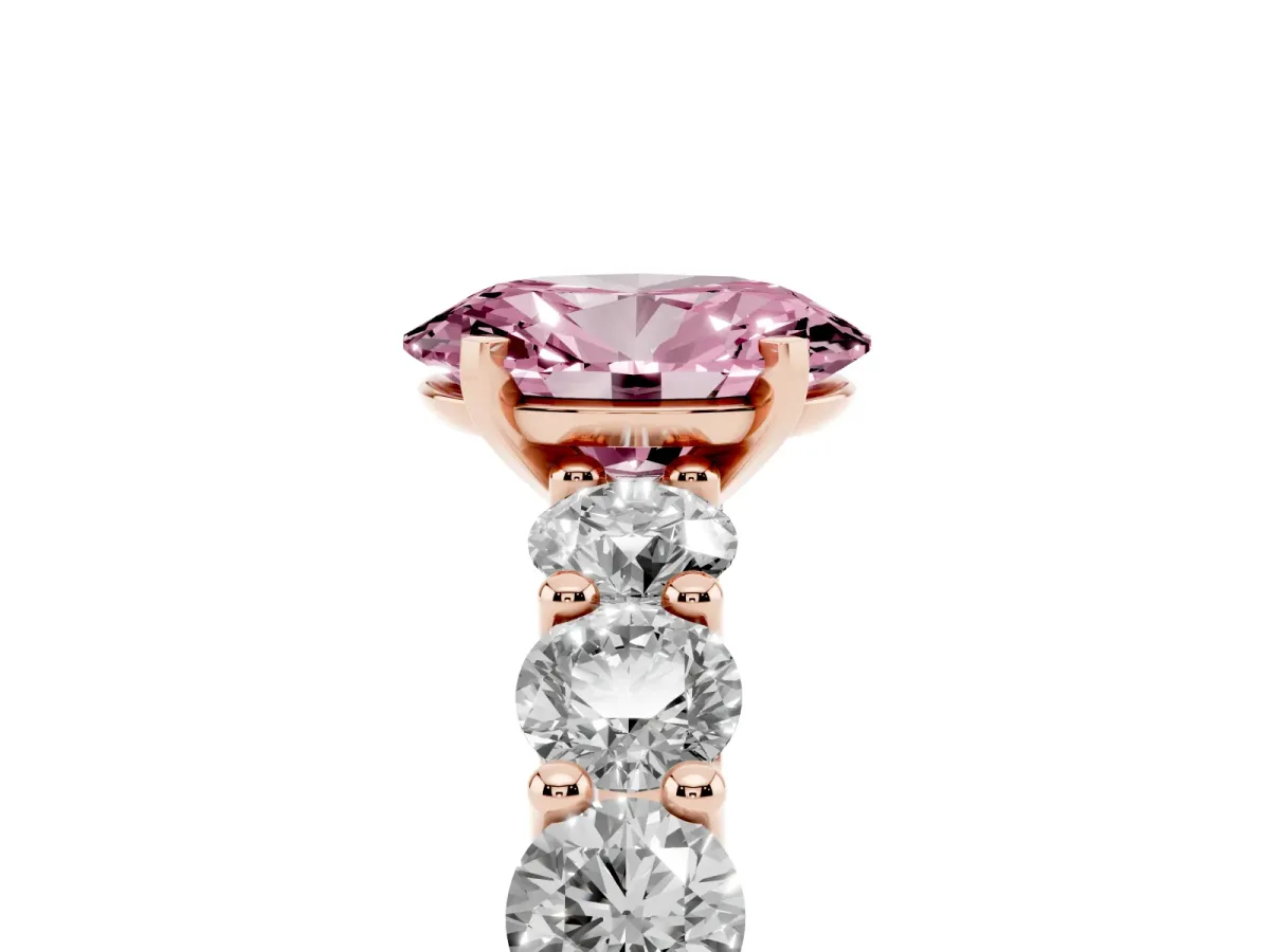 Fancy Pink Oval Cut Diamond Prong Setting with Side Stones on a Pave Band Rose gold