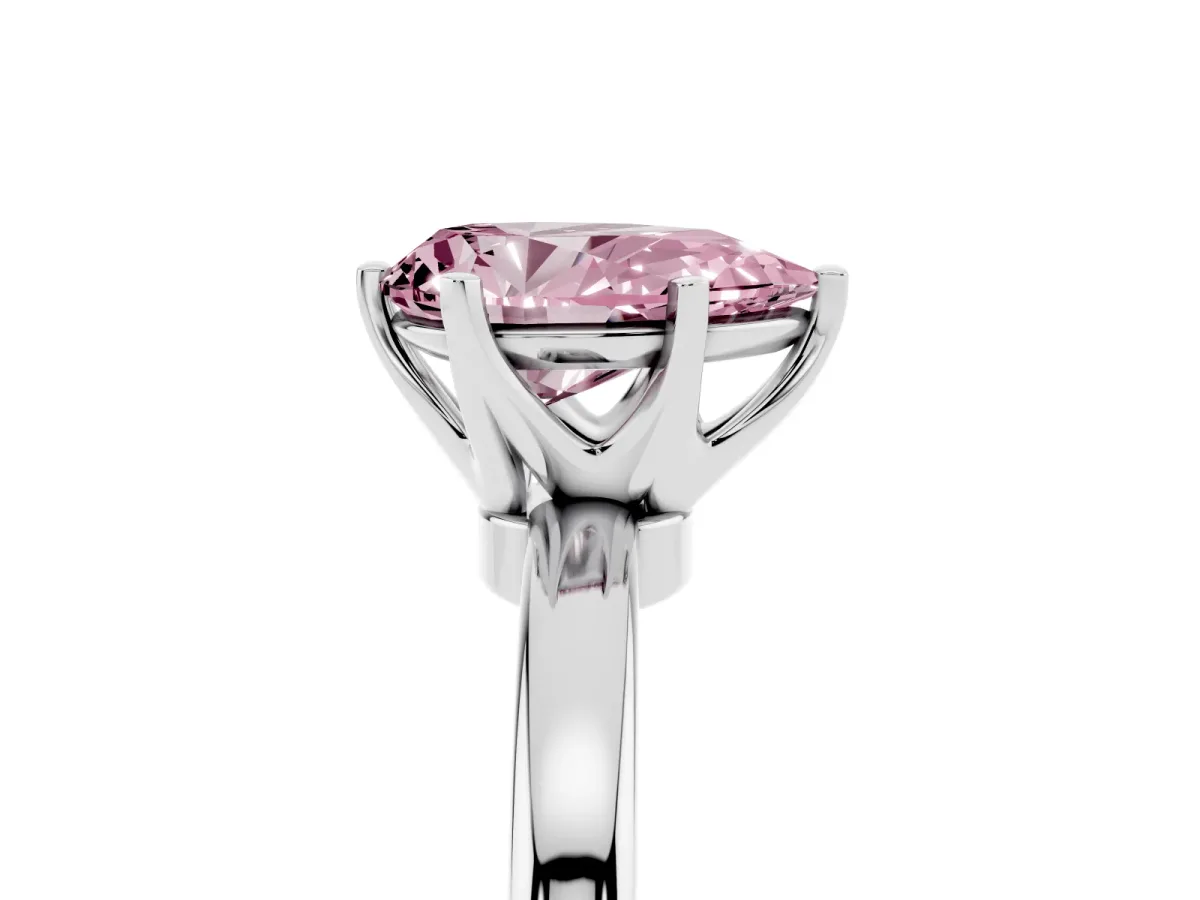 Fancy Pink Pear Cut Solitaire Diamond Ring with Six-Prong Setting on a Classic Band Silver