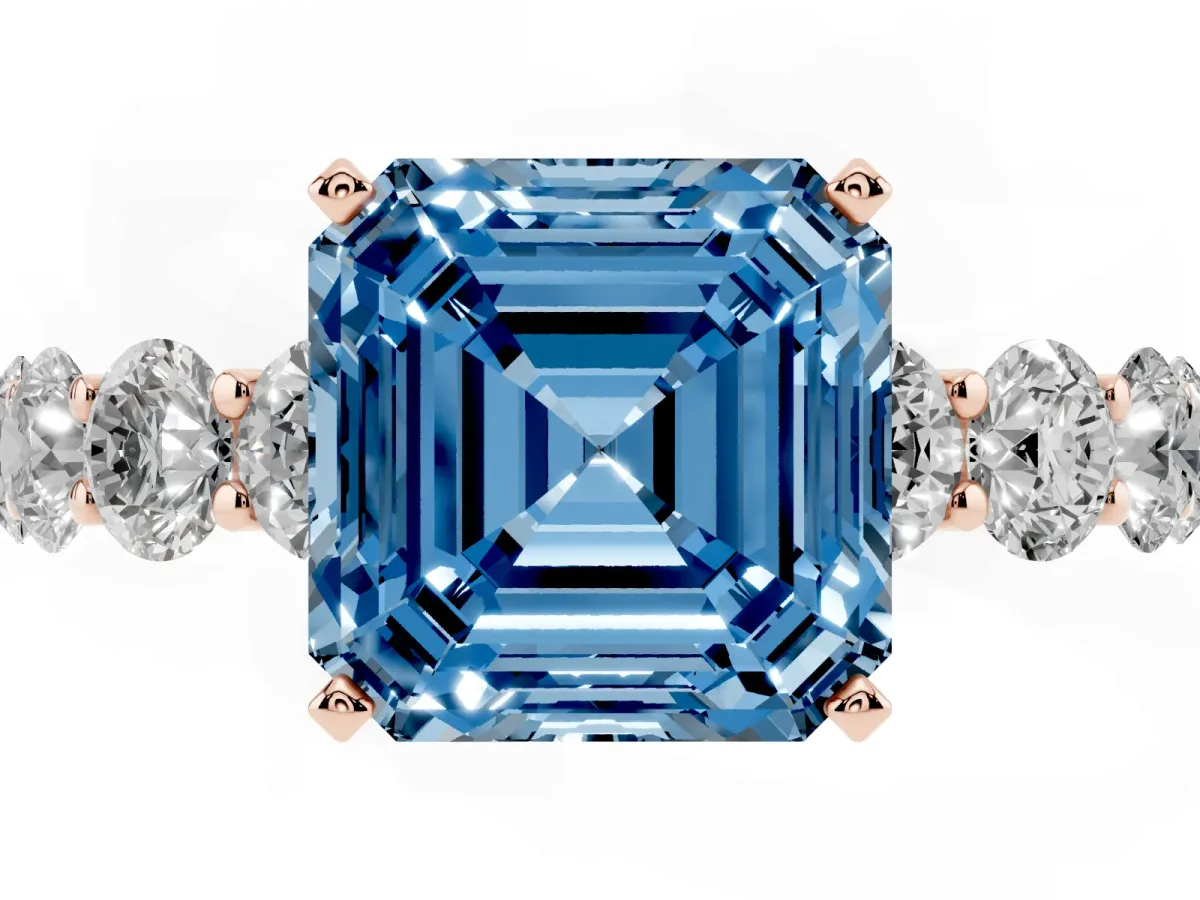 Fancy Blue Asscher Cut Diamond Prong Setting with Side Stones on a Pave Band Rose gold