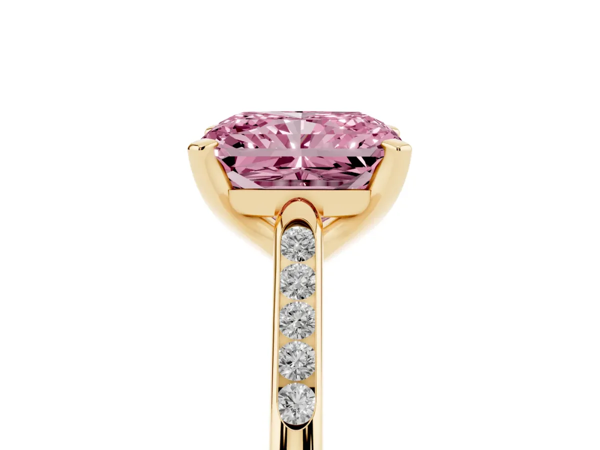 Fancy Pink Radiant Cut Diamond Solitaire Ring with Channel Set Round Band and Prong Setting Yellow gold