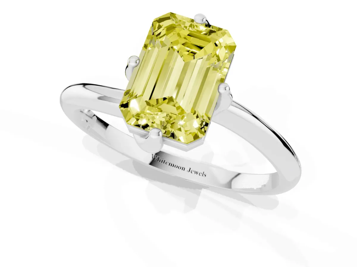 Fancy Yellow Emerald Cut Diamond Solitaire Engagement Ring with Four-Prong Setting and Classic Band Silver