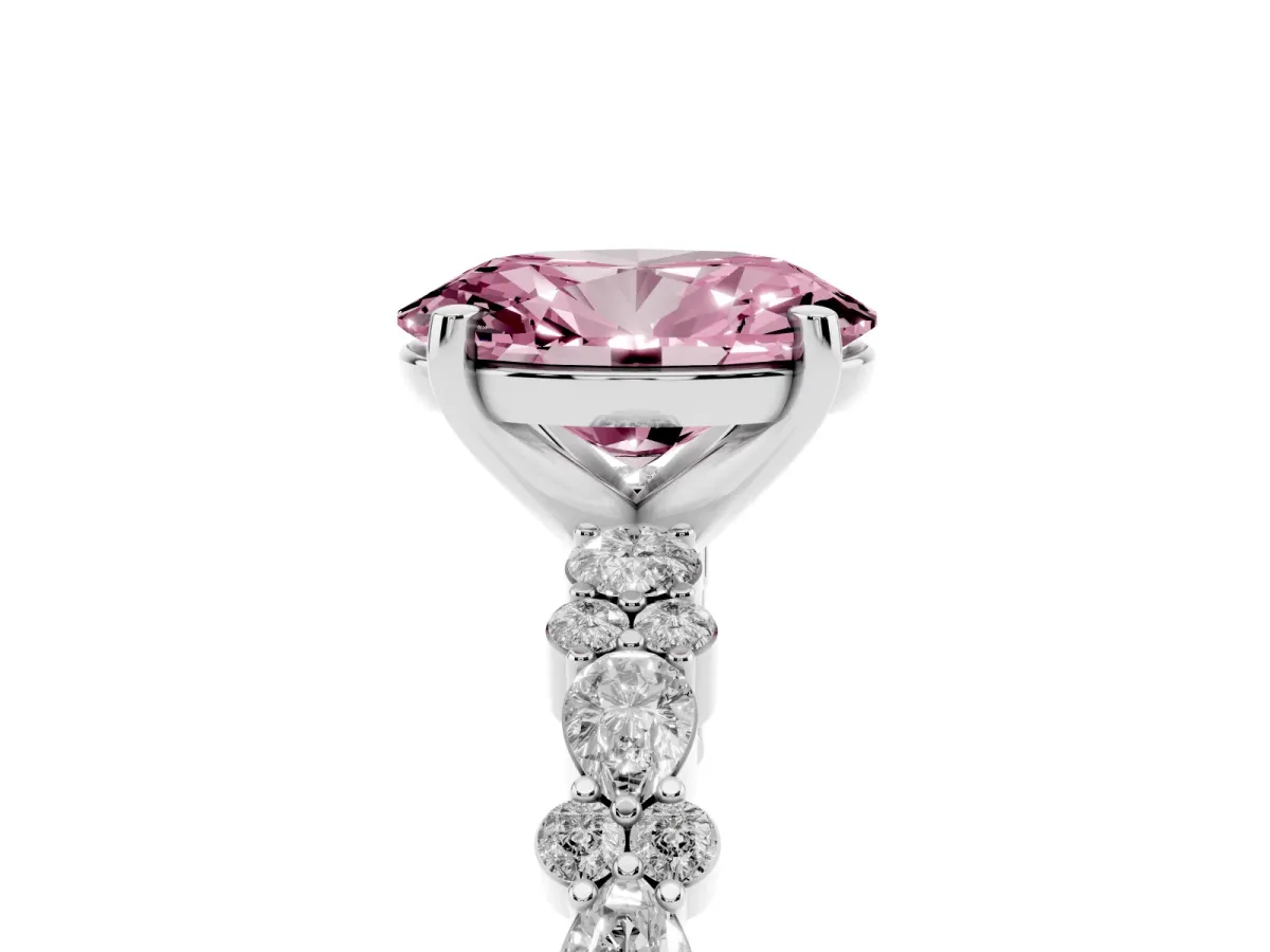 Fancy Pink Oval Cut Diamond Side Stone Solitaire Ring with Round and Four-Prong Setting Platinum