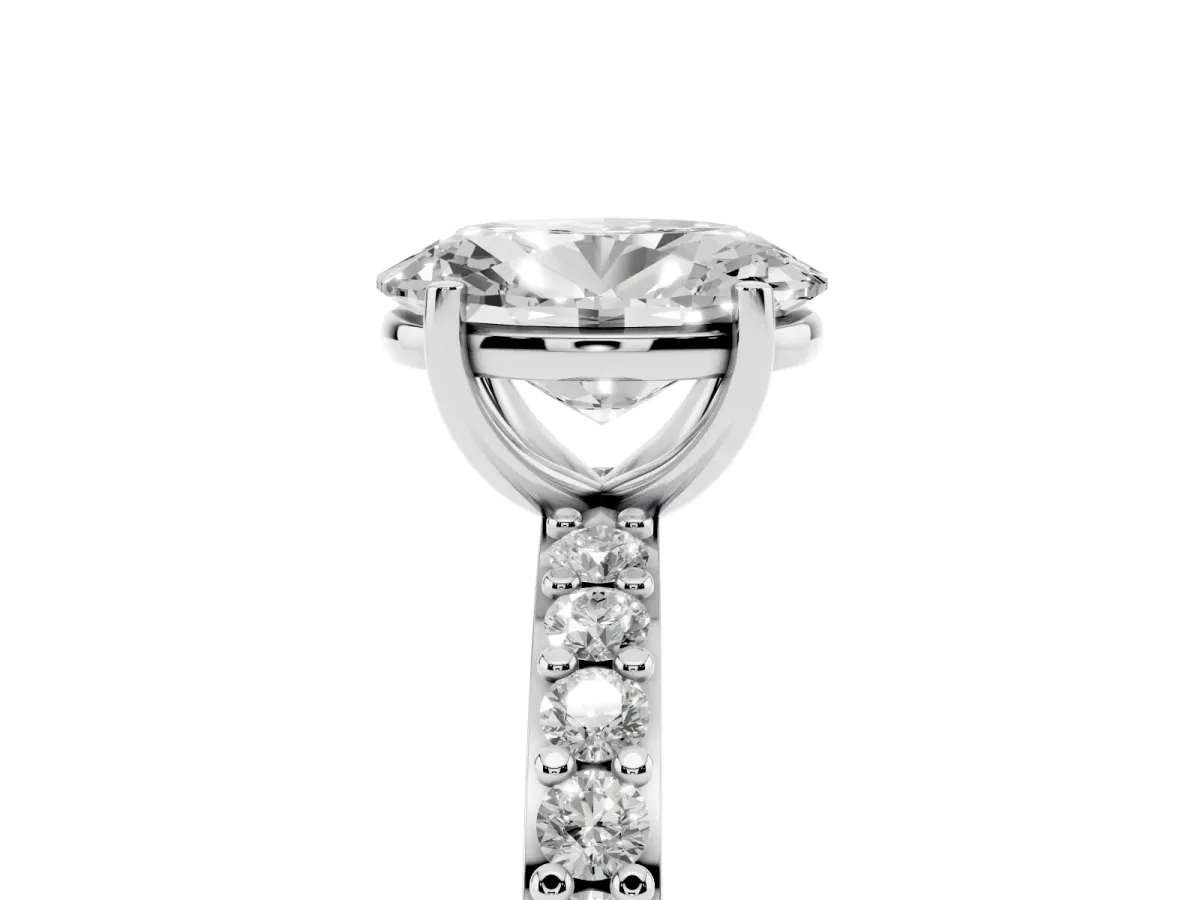 Oval Cut Cut Diamond Solitaire with Pave Band and Four-Prong Setting Silver