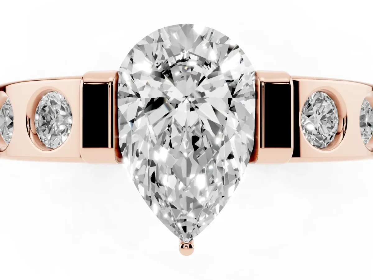 Pear Cut Brilliant Channel-Set Diamond Ring with Bezel Prong Setting Rose gold