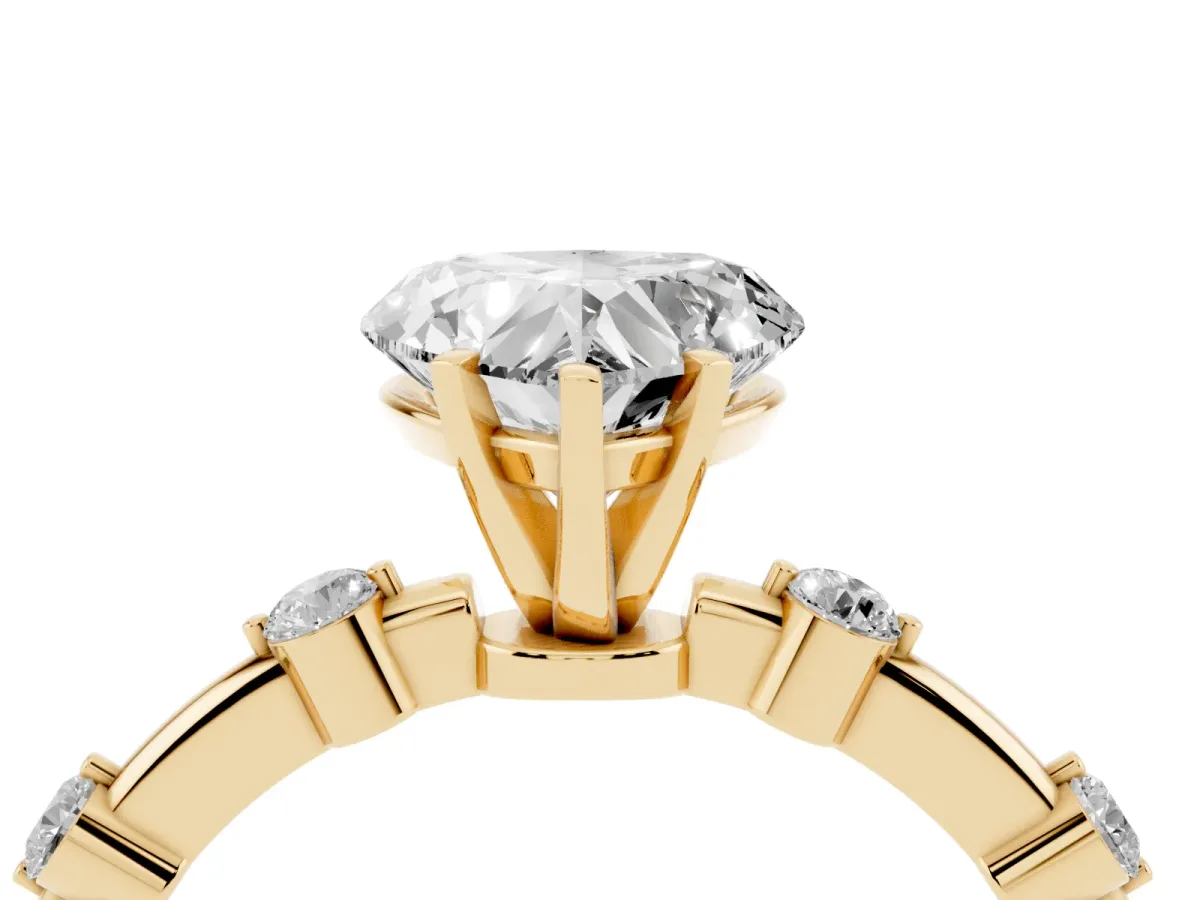 Heart Cut Solitaire Diamond Ring with Bezel Set Side Stones and Prong Setting Yellow gold