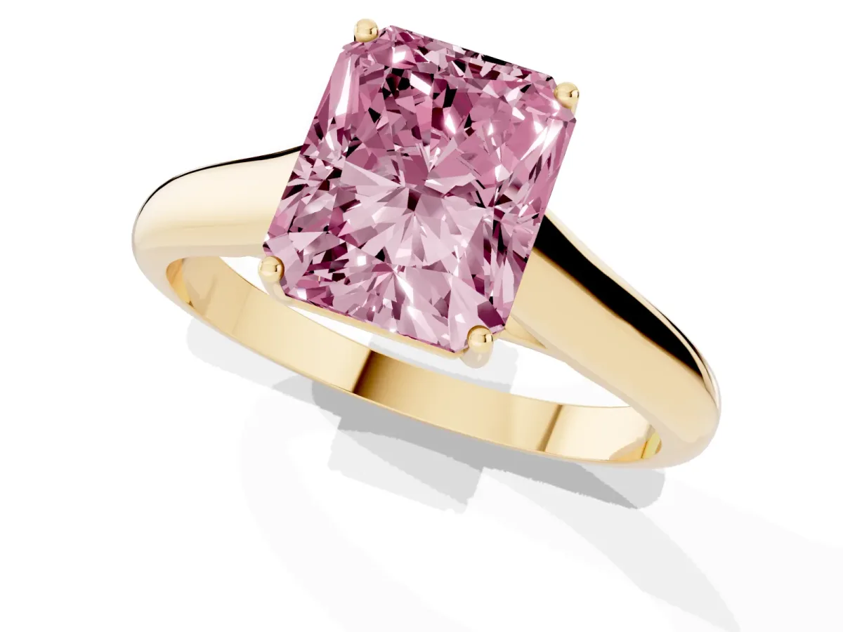 Fancy Pink Radiant Cut Solitaire Engagement Ring with Tapered Band and Four-Prong Setting Yellow gold