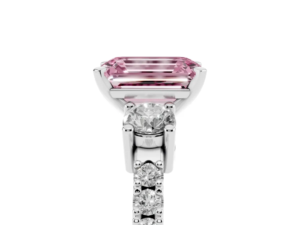 Fancy Pink Emerald Cut Three-Stone Diamond Pavé Band with Prong Setting Platinum