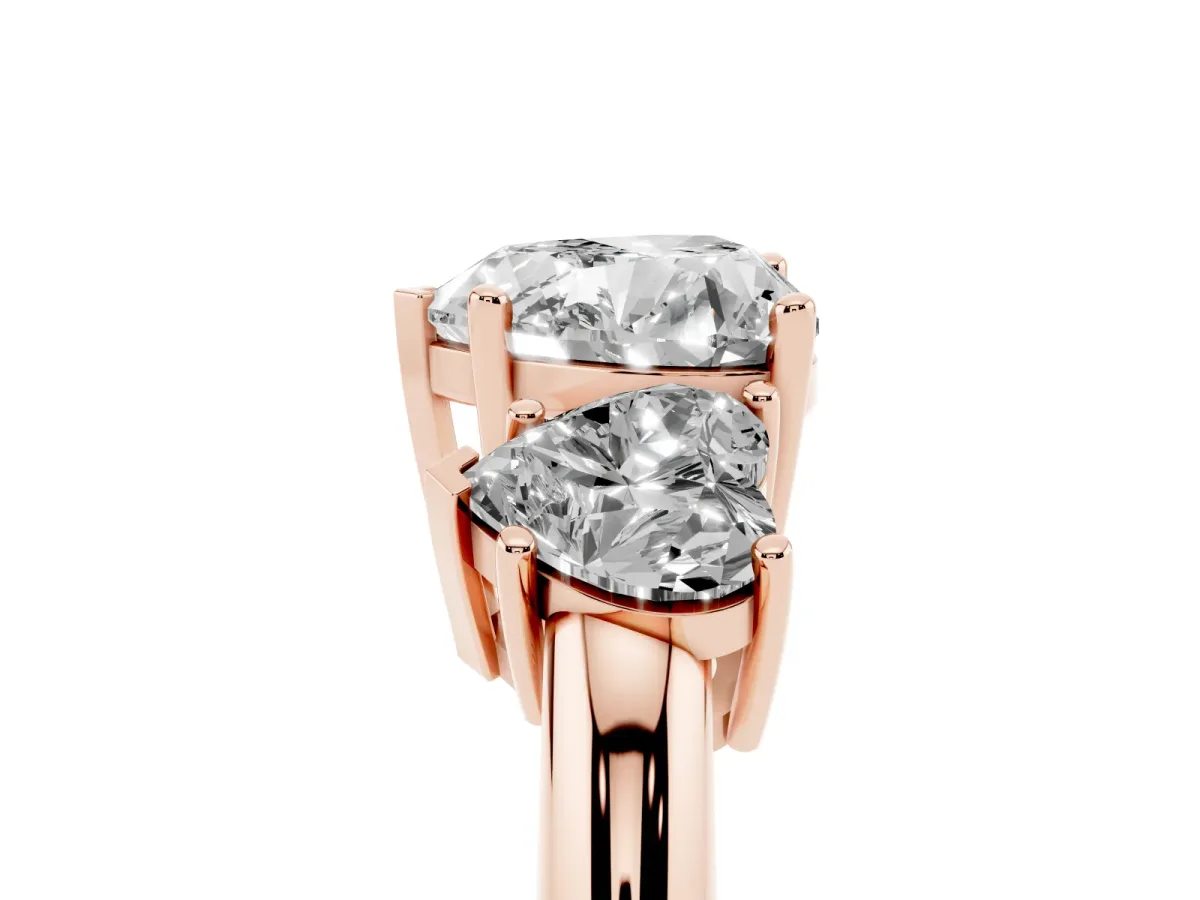 Three-Stone Heart Cut Cut Diamond Engagement Ring with Prong Setting on a White Gold Band Rose gold