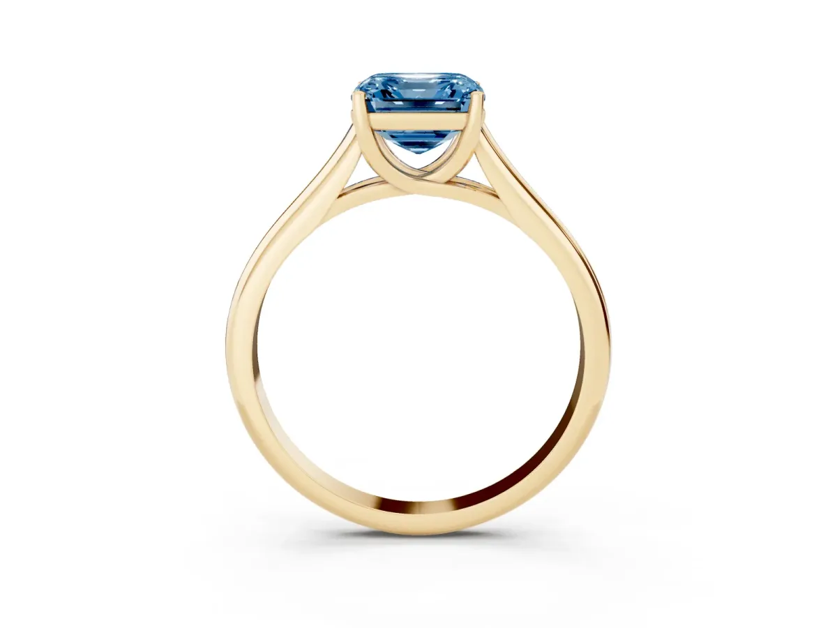Fancy Blue Asscher Cut Solitaire Engagement Ring with Tapered Band and Four-Prong Setting Yellow gold