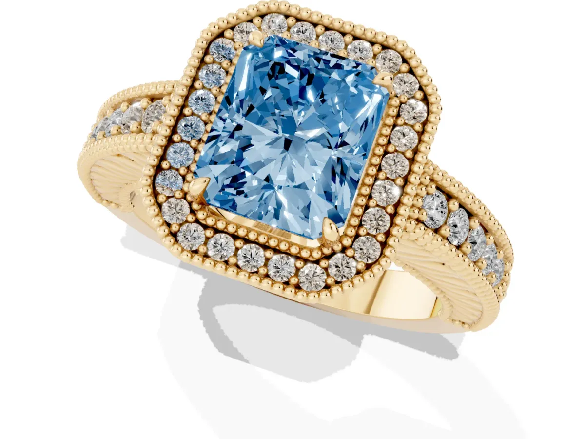 Fancy Blue Radiant Cut Cut Halo Diamond Ring with Pavé Band and Four-Prong Setting Yellow gold