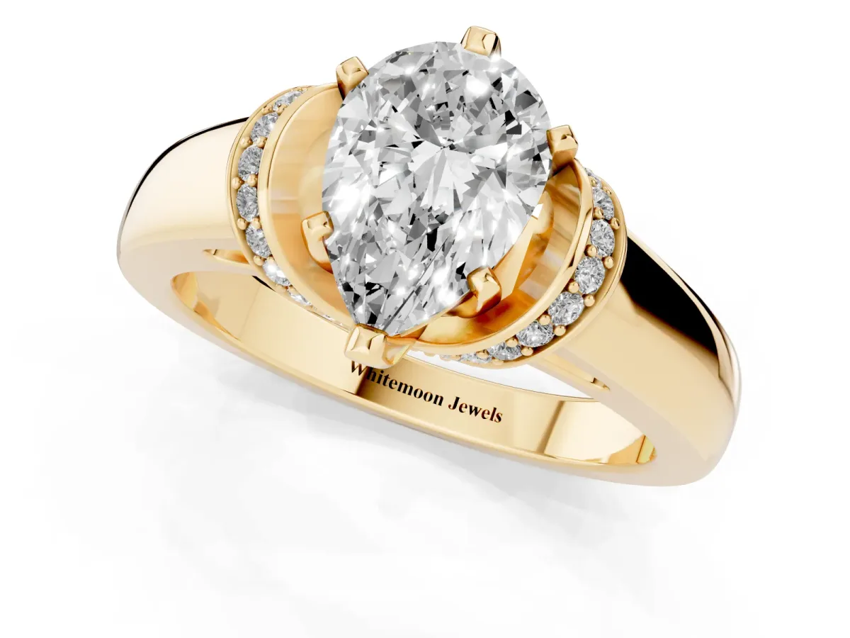 Pear Cut Solitaire Diamond Ring with Pave Band and Six-Prong Setting Yellow gold