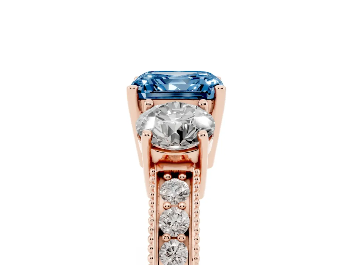 Fancy Blue Asscher Cut Three-Stone Diamond Ring with Pavé Band and Four-Prong Setting Rose gold