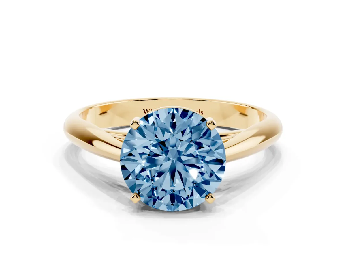 Fancy Blue Round Cut Diamond Solitaire Engagement Ring with Cathedral Setting and Four-Prong Mount Yellow gold