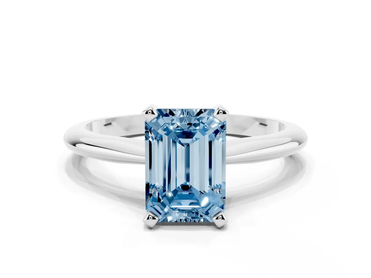 Fancy Blue Emerald Cut Cut Solitaire Ring with Four-Prong Setting on a Classic Band White gold