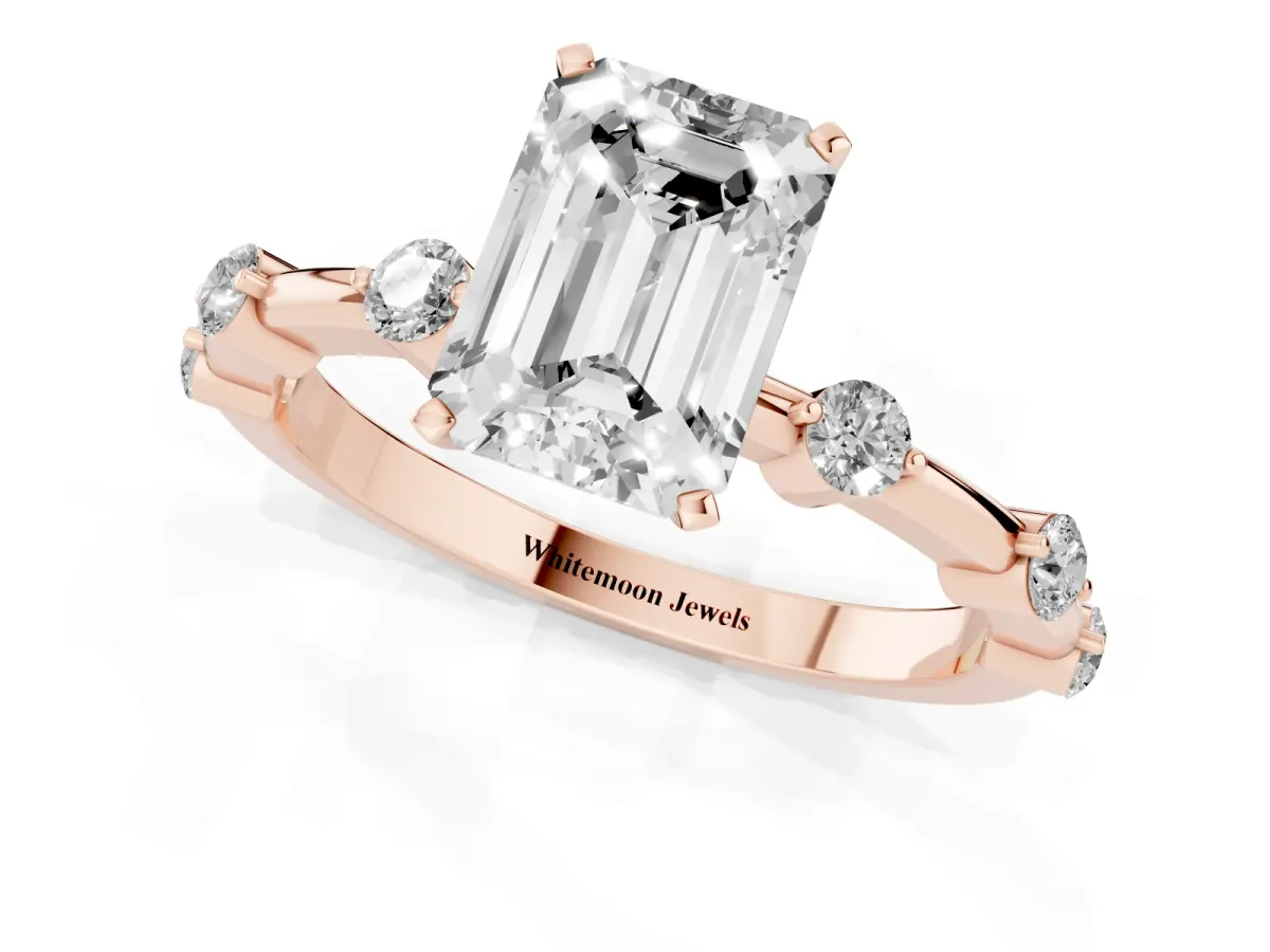 Emerald Cut Solitaire Diamond Ring with Bezel Set Side Stones and Prong Setting Rose gold