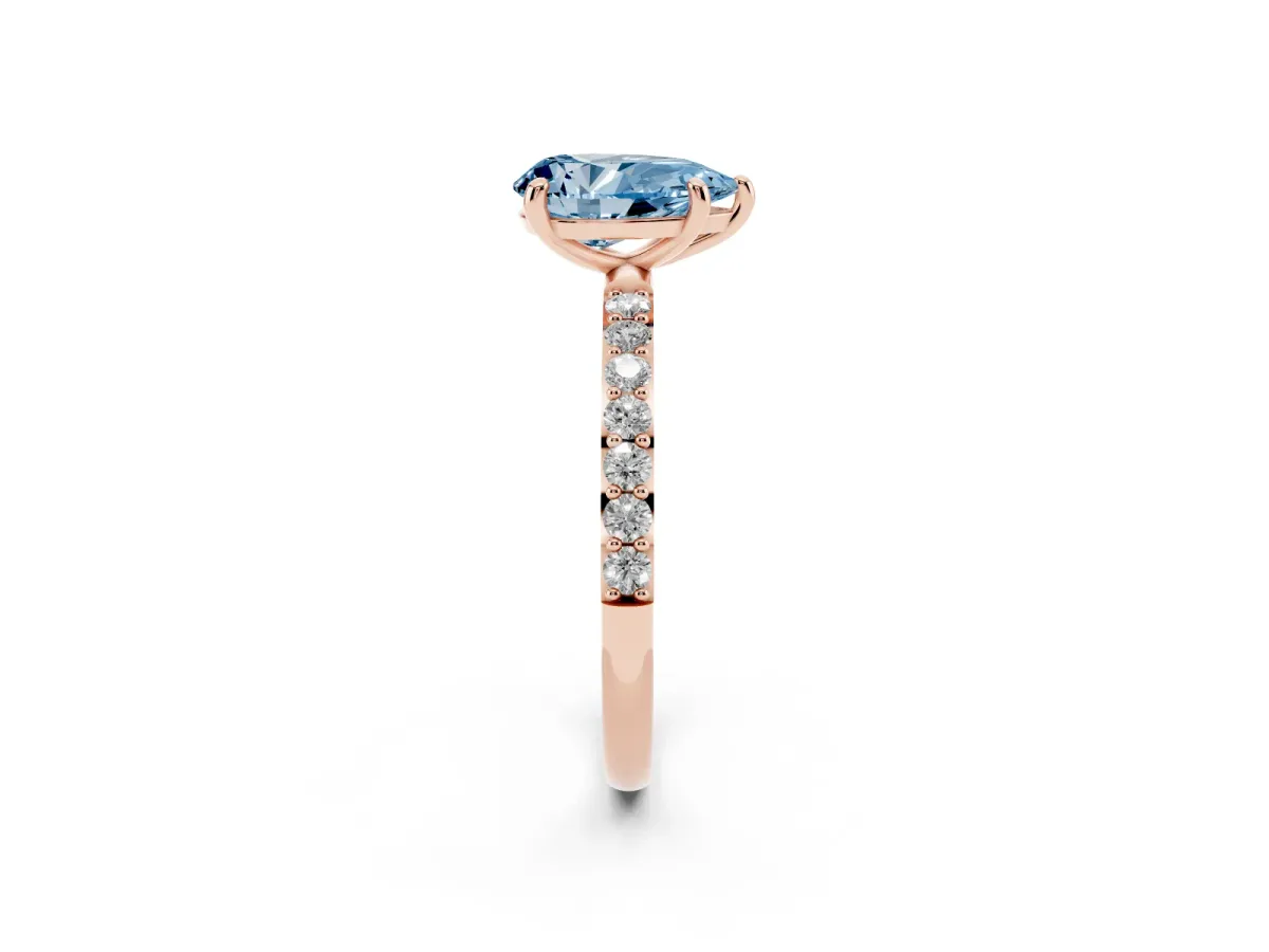 Fancy Blue Pear Cut Diamond Solitaire Ring with Round Pavé Band and Prong Setting Rose gold