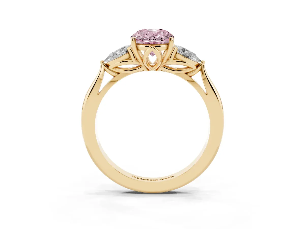 Fancy Pink Oval Cut Diamond Three-Stone Ring with Pear Side Stones and Prong Setting Yellow gold