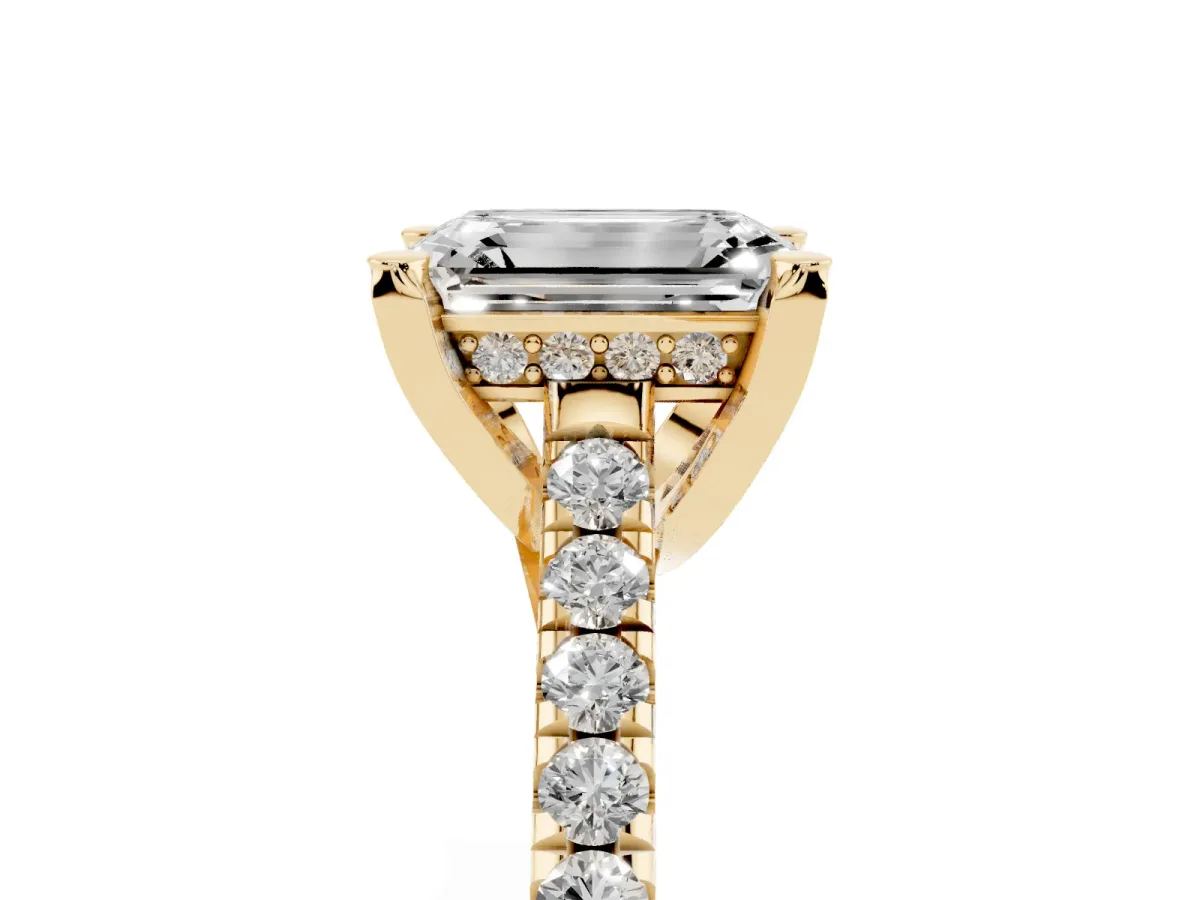 Emerald Cut Brilliant Diamond Solitaire with Pavé Band and Four-Prong Setting Yellow gold