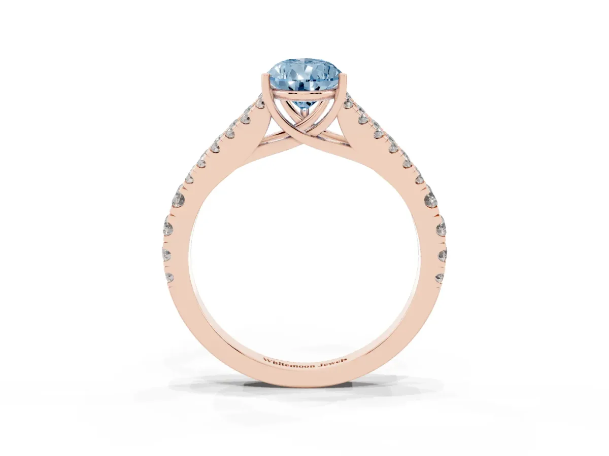Fancy Blue Pear Cut Diamond Split Shank Pavé Engagement Ring with Four-Prong Setting Rose gold