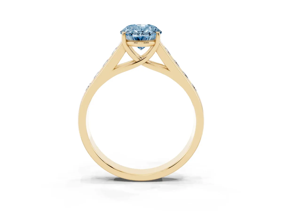 Fancy Blue Oval Cut Solitaire Channel-Set Diamond Engagement Ring with Four-Prong Setting Yellow gold