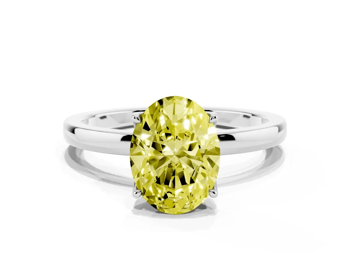 Fancy Yellow Oval Cut Diamond Solitaire Ring with Thin Band and Prong Setting Silver