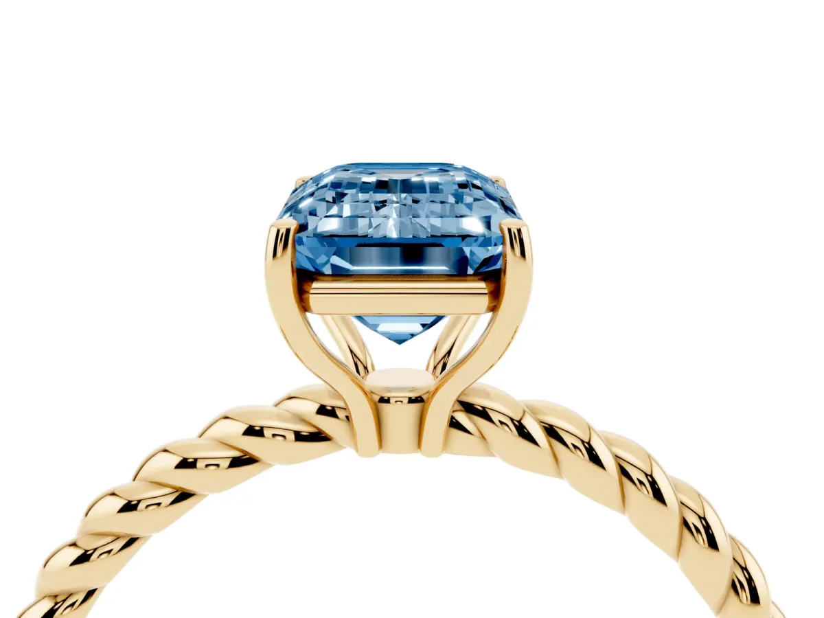 Fancy Blue Emerald Cut Solitaire Twisted Band 4-Prong Ring Yellow gold