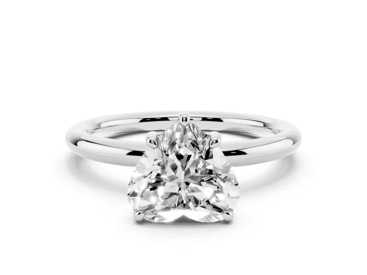 Heart Cut Solitaire Diamond Ring with Four-Prong Setting on a Plain Band Platinum