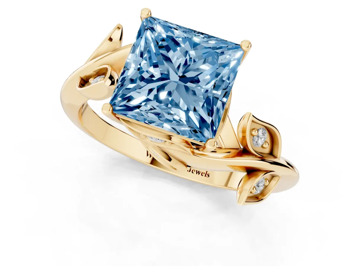 Fancy Blue Princess Cut Solitaire Twist Engagement Ring with Leaf Accents and Prong Setting Yellow gold