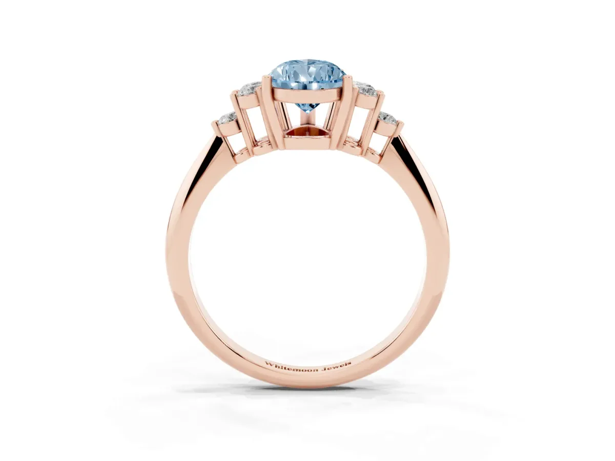 Fancy Blue Pear Cut Cut Diamond Cluster Ring with Solitaire Band and Four-Prong Setting Rose gold