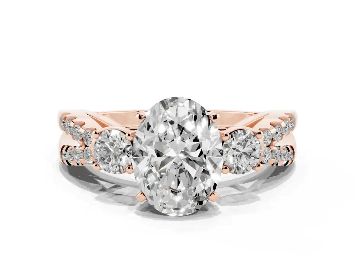 Oval Cut Diamond Three-Stone Ring with Pavé Split Shank and Four-Prong Setting Rose gold
