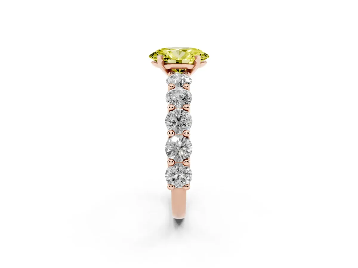 Fancy Yellow Oval Cut Diamond Prong Setting with Side Stones on a Pave Band Rose gold