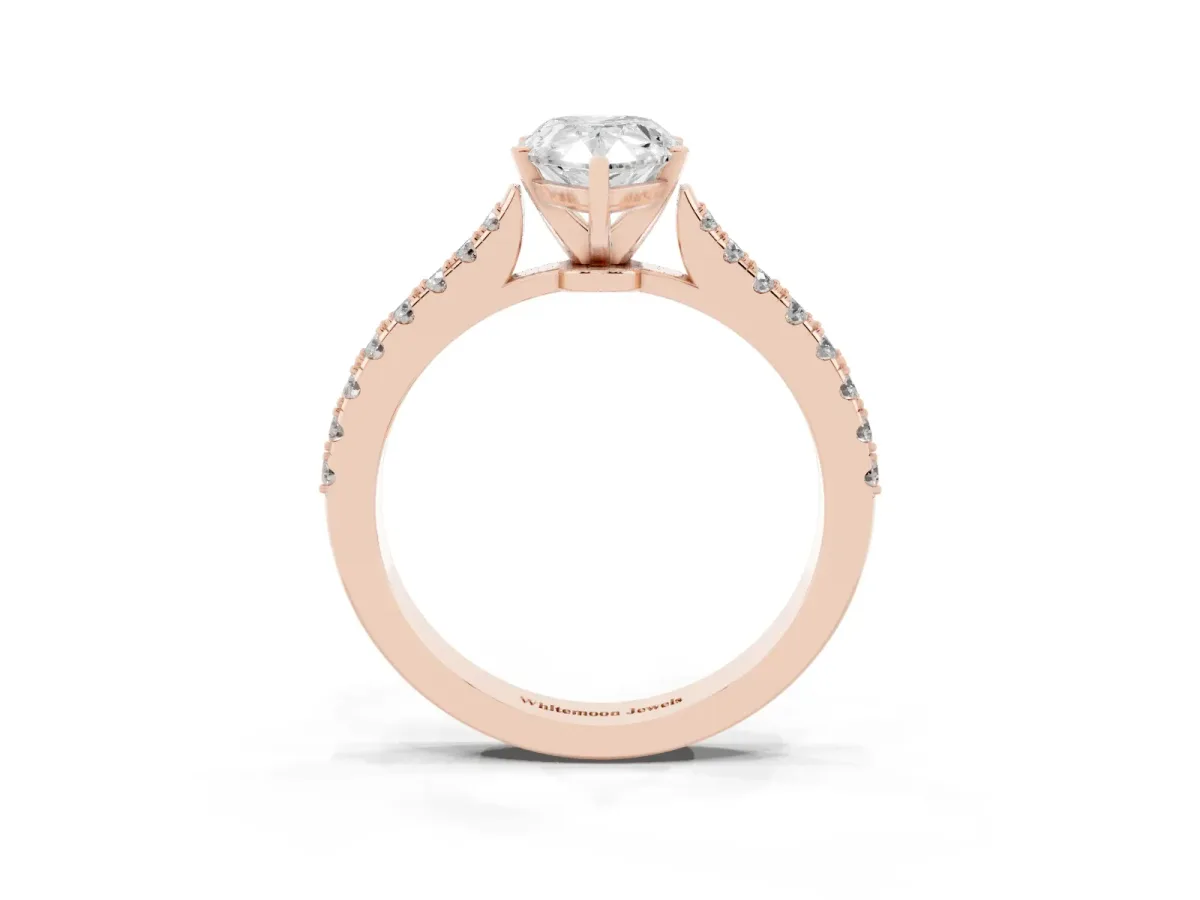 Pear Cut Cut Solitaire Diamond Engagement Ring with Pave Band and Four-Prong Setting Rose gold