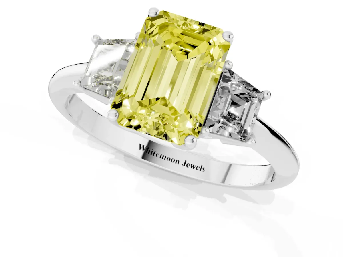Fancy Yellow Emerald Cut Diamond Three-Stone Ring with Trapezoid Side Stones and Prong Setting Silver