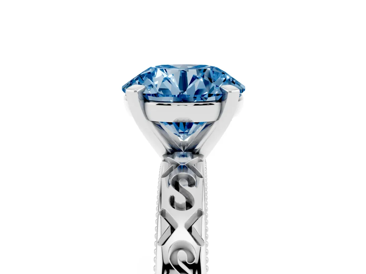Fancy Blue Round Cut Solitaire Engagement Ring with Scrollwork Band and Four-Prong Setting Silver