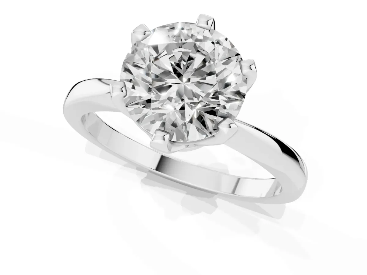 Round Cut Solitaire Engagement Ring with Six-Prong Setting and Tapered Band Platinum