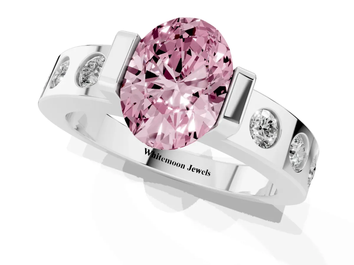 Fancy Pink Oval Cut Brilliant Channel-Set Diamond Ring with Bezel Prong Setting Platinum