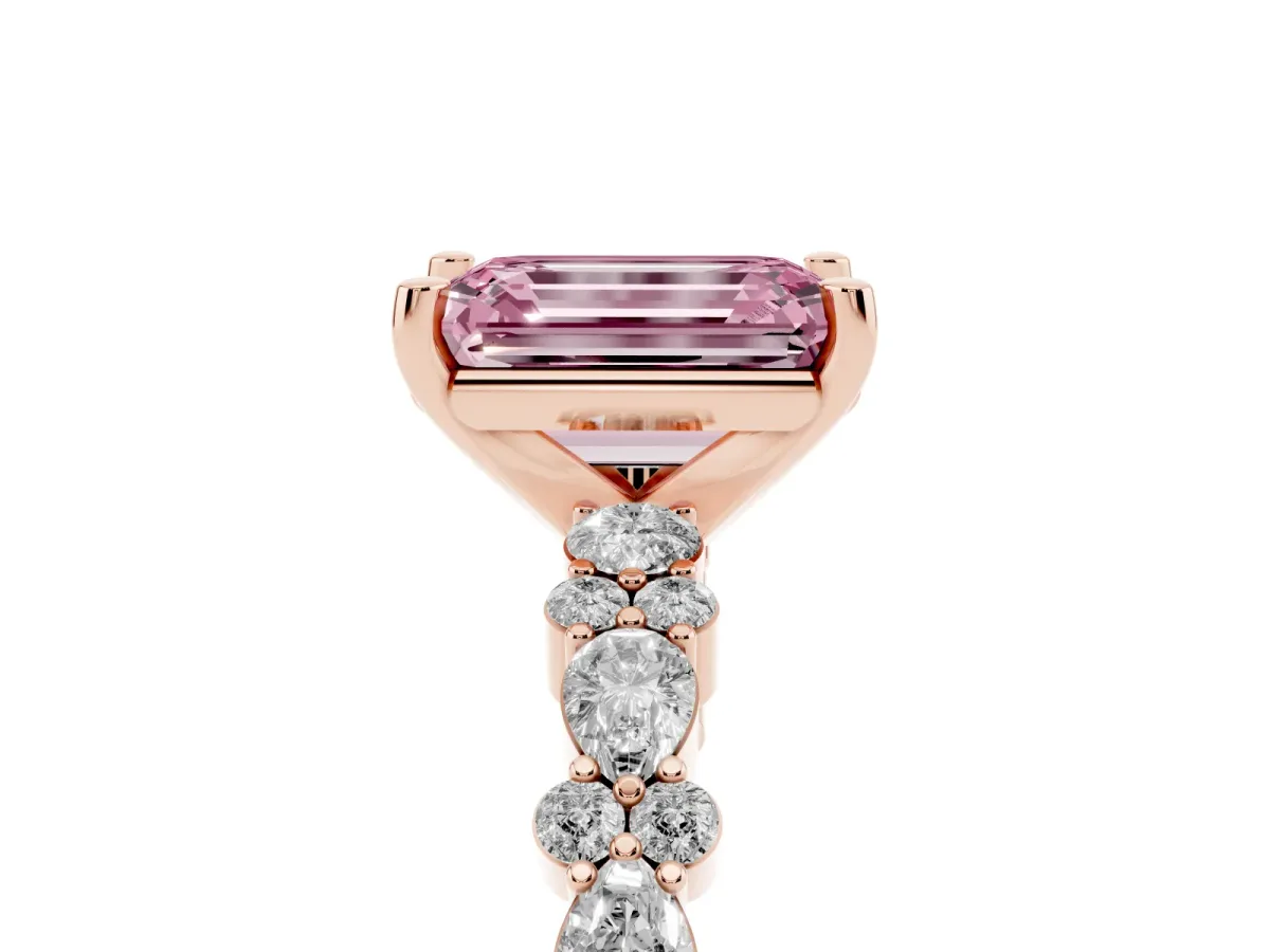 Fancy Pink Emerald Cut Diamond Side Stone Solitaire Ring with Round and Four-Prong Setting Rose gold