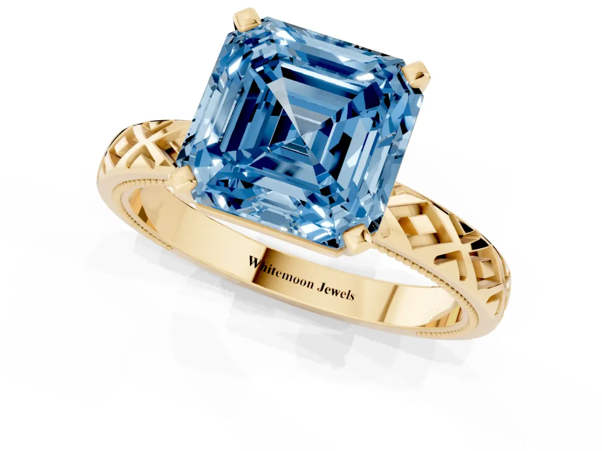 Fancy Blue Asscher Cut Solitaire Diamond Ring with Milgrain and Black Enamel X Pattern Band Yellow gold