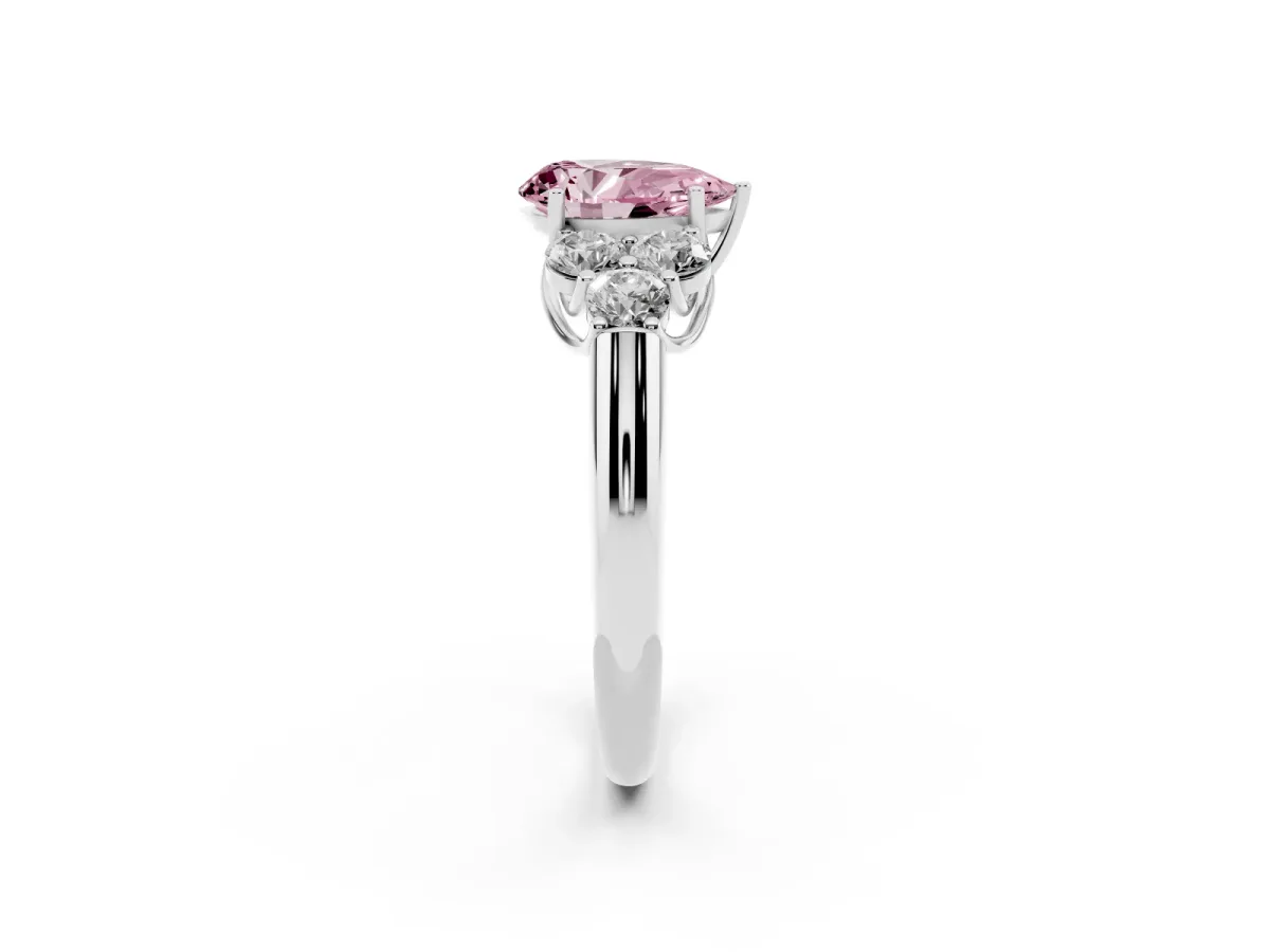 Fancy Pink Pear Cut Cut Diamond Cluster Ring with Round Accent Stones and Prong Setting on a Classic Band White gold