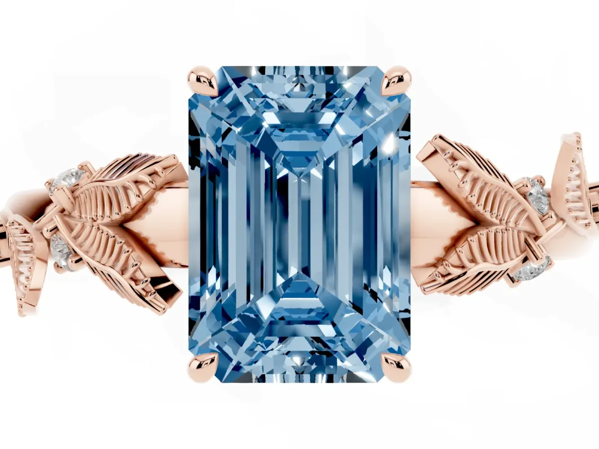Fancy Blue Emerald Cut Diamond Solitaire Ring with Leaf Motif Band and Four-Prong Setting Rose gold