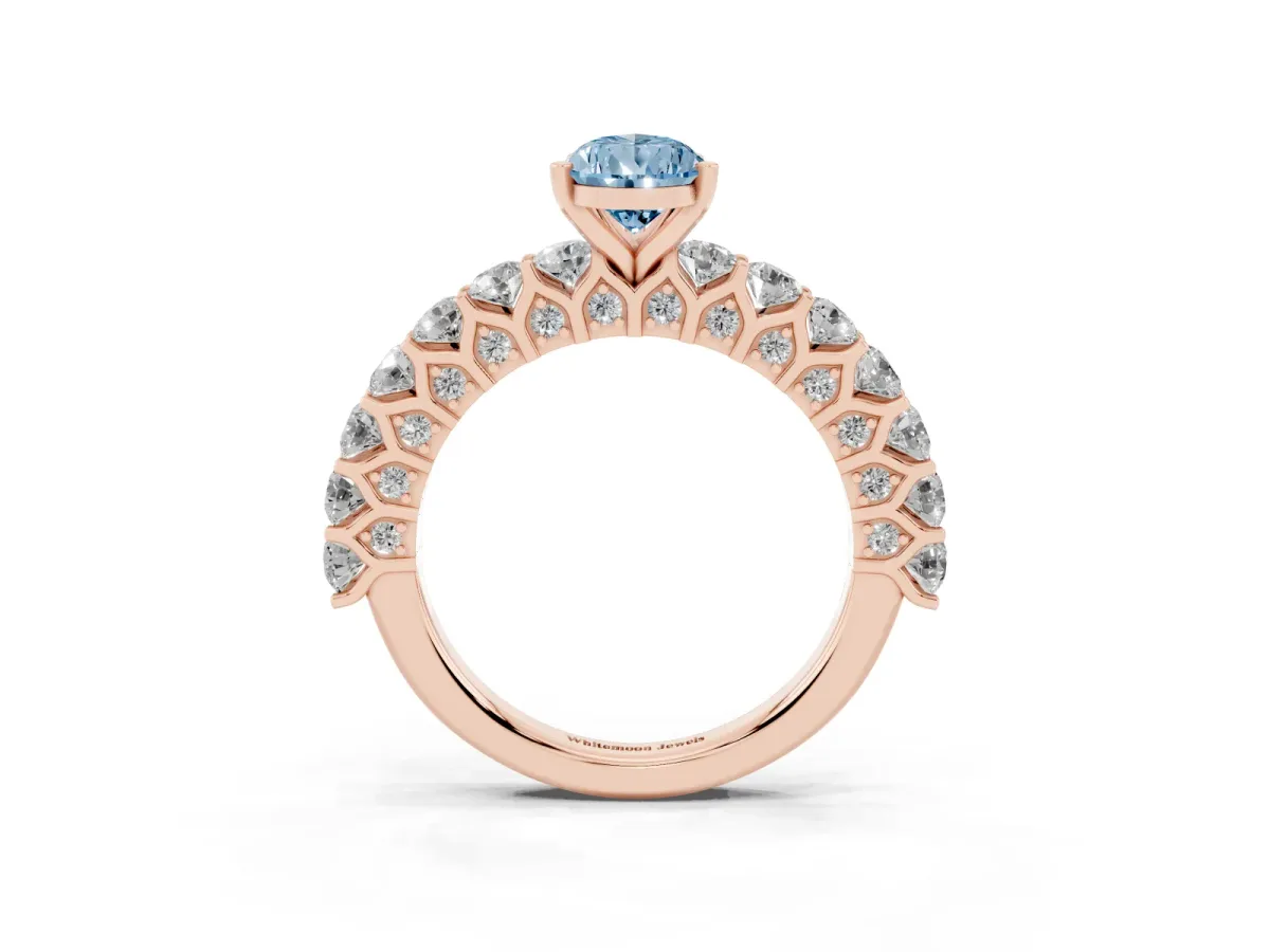 Fancy Blue Pear Cut Diamond Solitaire Ring with Shared Prong Pavé Band and Four-Prong Setting Rose gold