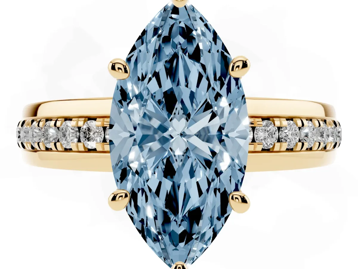 Fancy Blue Marquise Cut Solitaire Diamond Ring with Channel Set Band and Six-Prong Setting Yellow gold