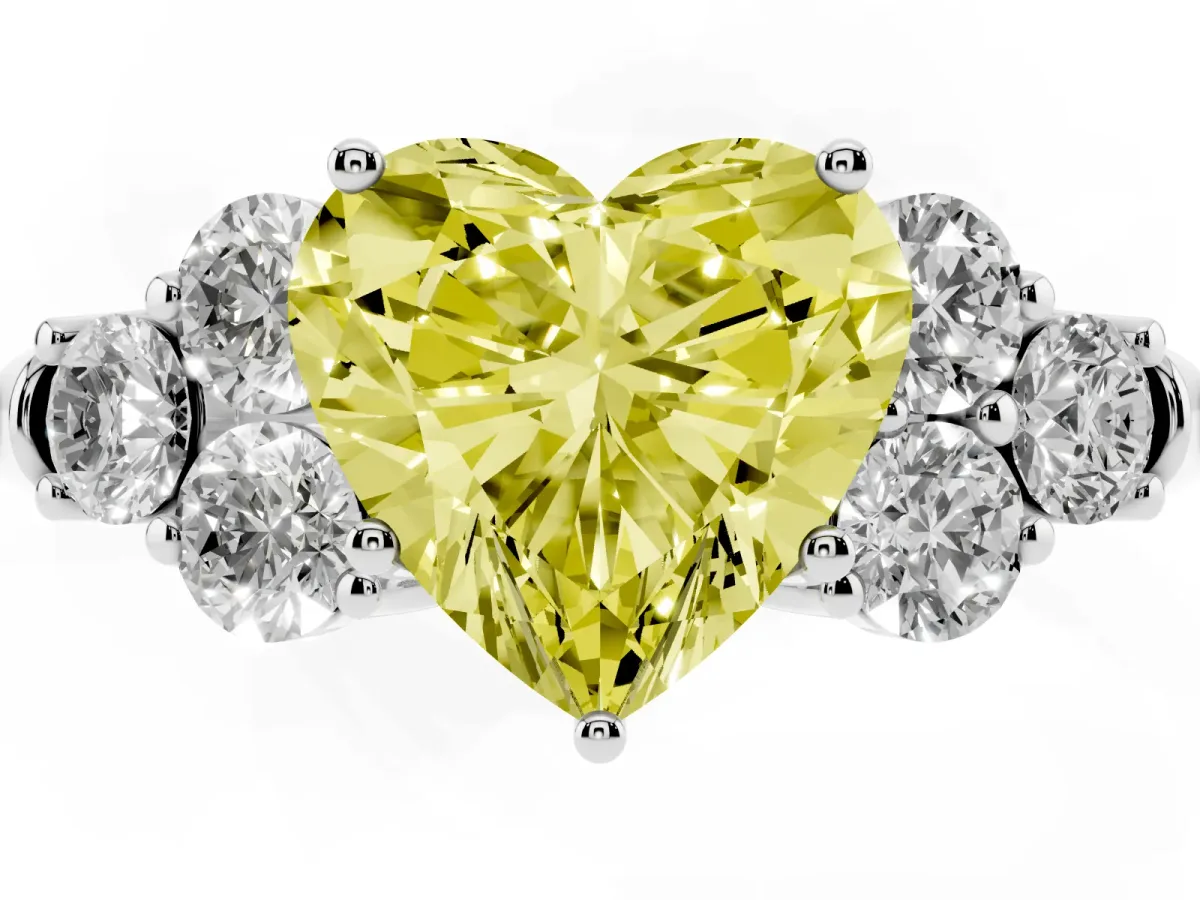Fancy Yellow Heart Cut Cut Diamond Cluster Ring with Round Accent Stones and Prong Setting on a Classic Band White gold